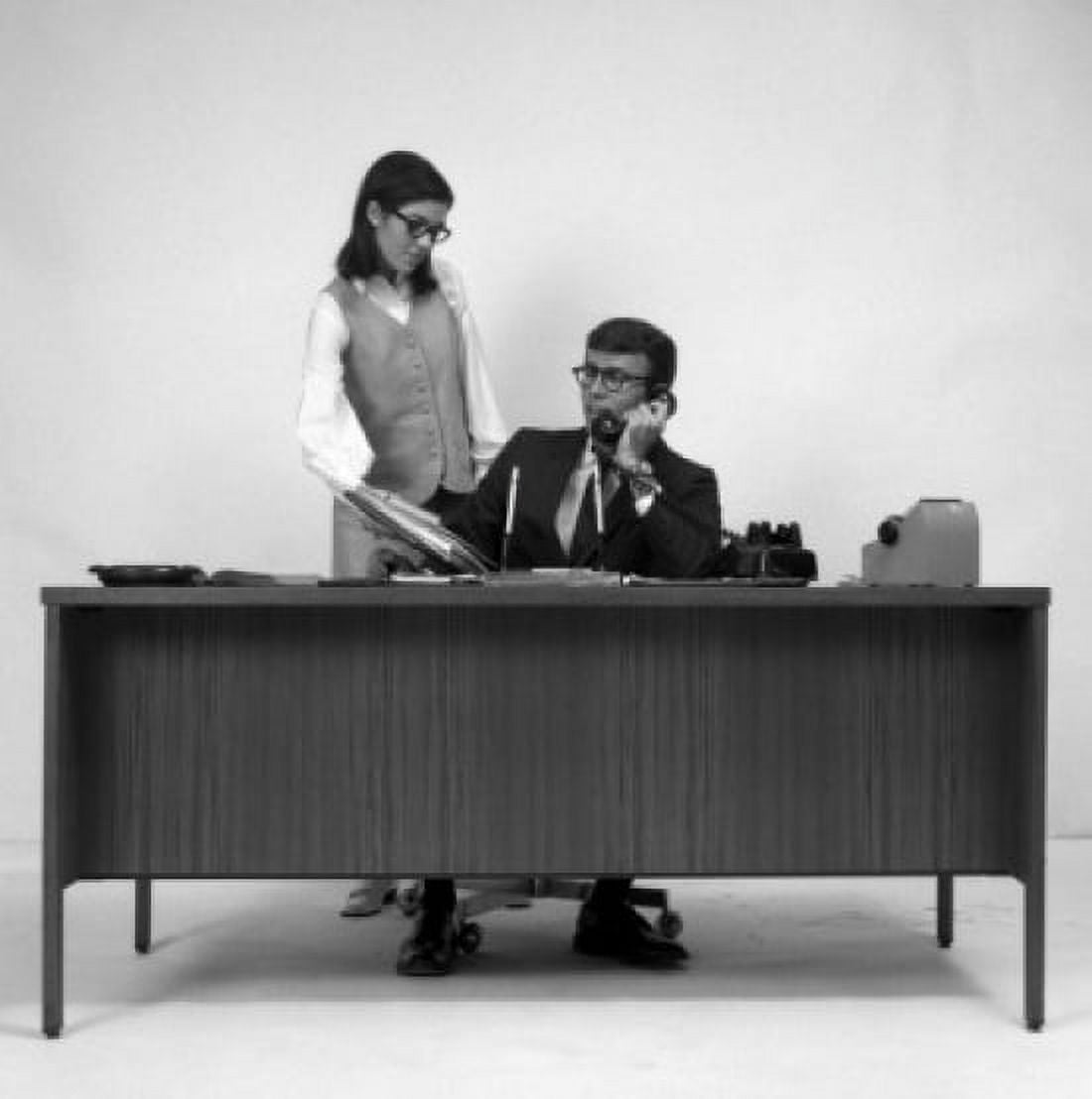 Secretary giving documents to businessman Canvas Art - (18 x 24)