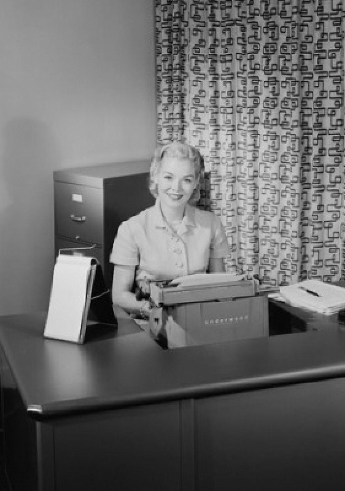 Secretary looking at camera and smiling Canvas Art - (24 x 36)