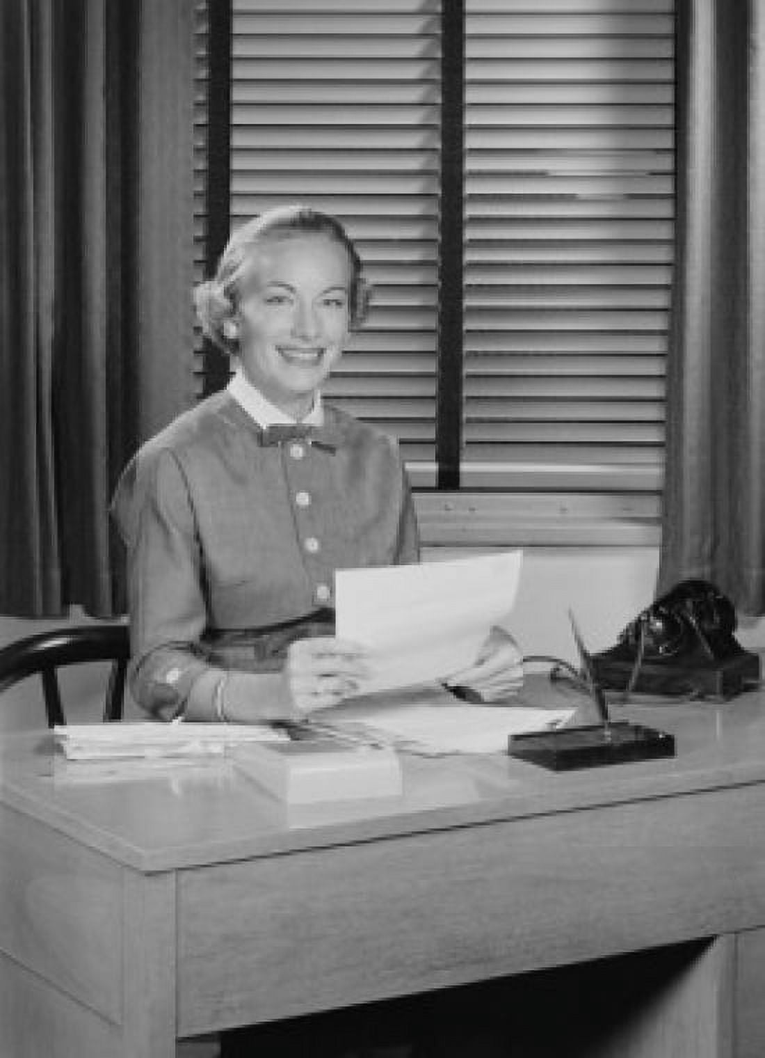 Secretary sitting at desk and reading letter Canvas Art - (24 x 36)