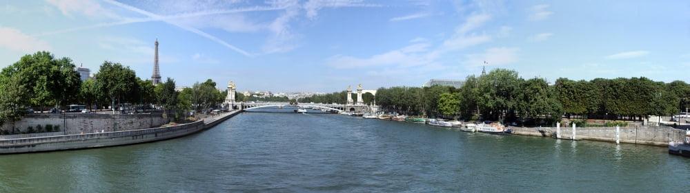 Seine River with Eiffel Tower in the background ParisIle-de-France France Canvas Art - Panoramic Images (27 x 9)