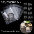 thumbnail image 1 of Self sealing translucent plastic bags, self adhesive packaging, frosted cellophane, jewelry, biscuits, gift and candy packaging (Translucent frosted,200pc 4x12cm-Use 4x9), 1 of 6