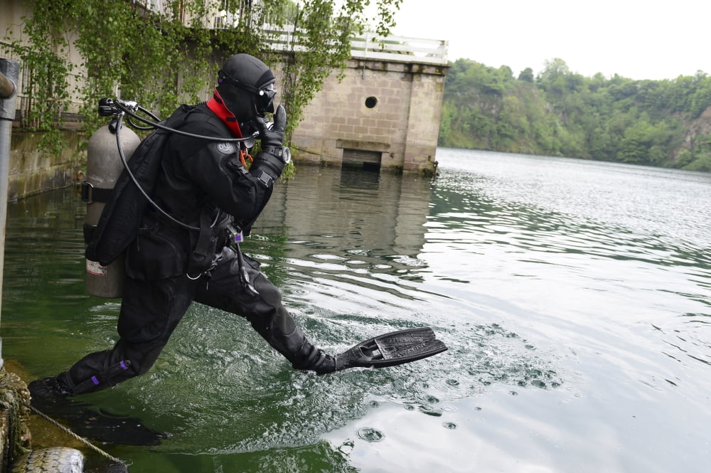 Senior Airman enters the water during rescue dive training Canvas Art - Stocktrek Images (35 x 23)