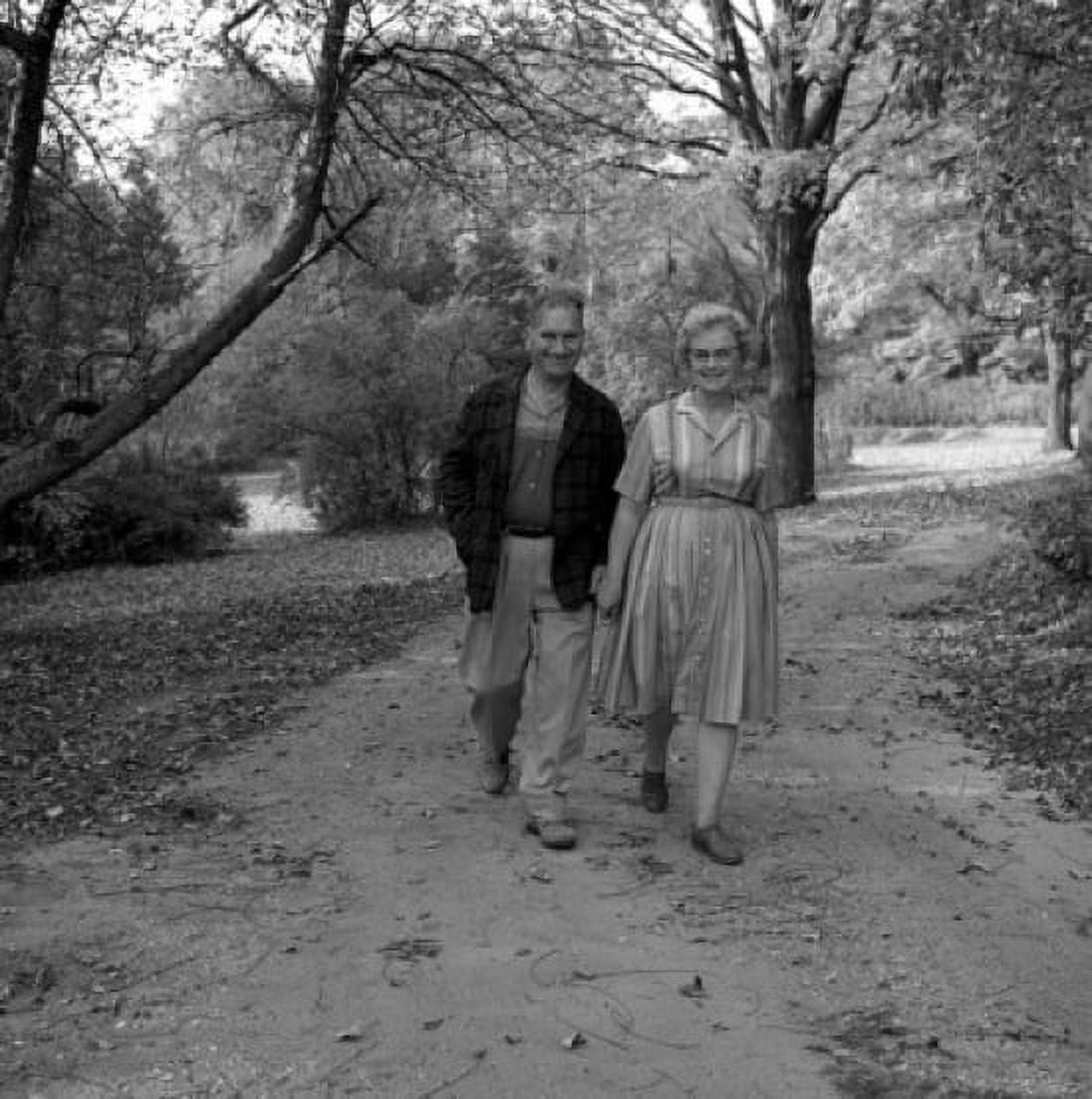 Senior couple on walk Canvas Art - (24 x 36)
