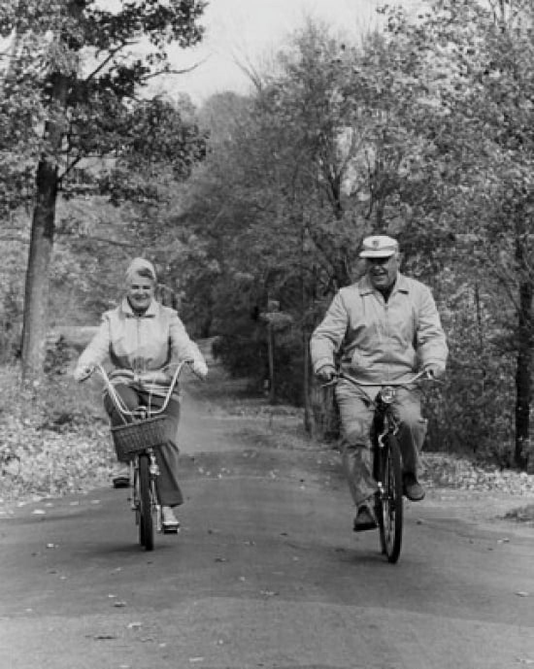 Senior couple riding bicycles Canvas Art - (18 x 24)