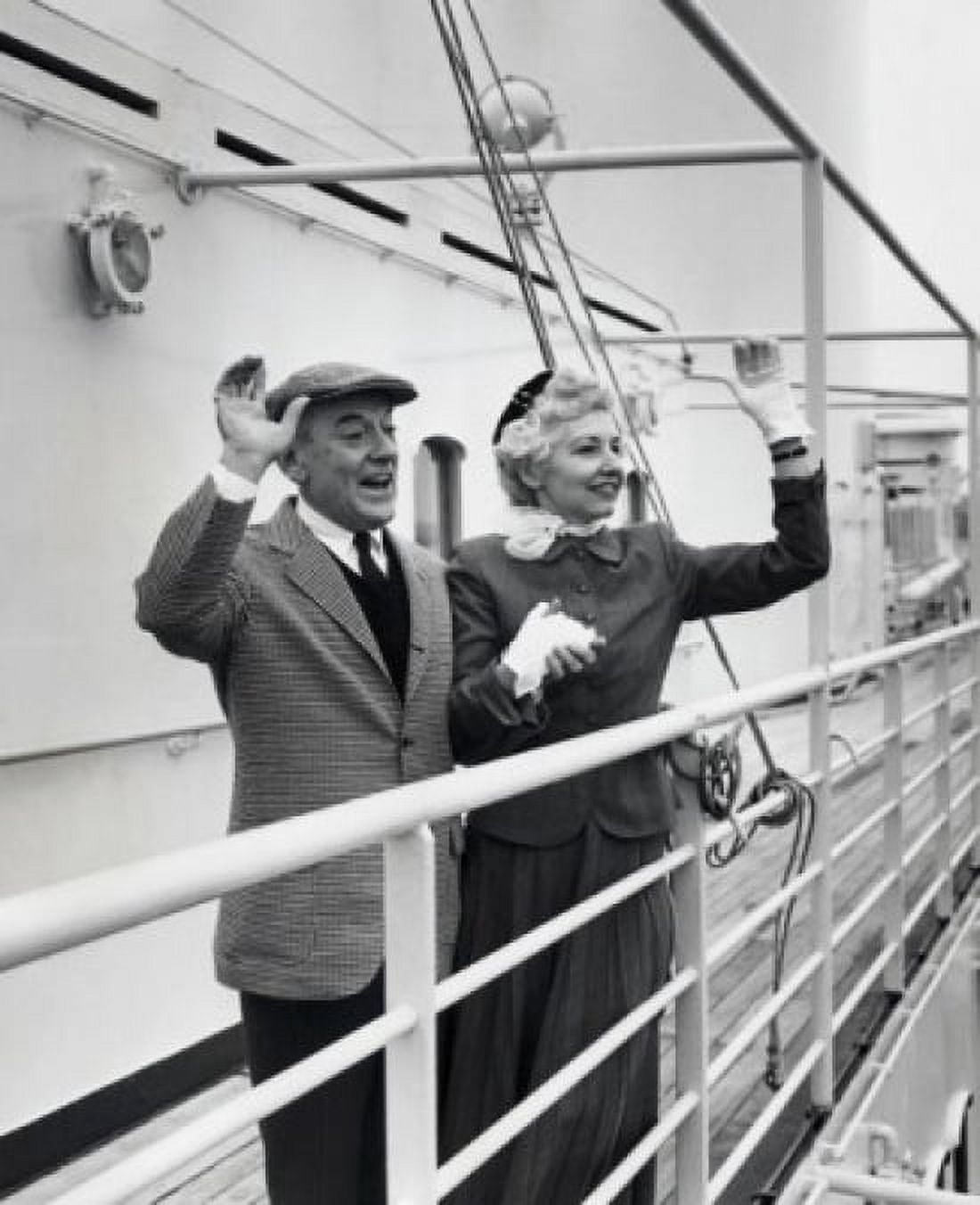 Senior couple standing on the deck of a cruise ship and waving Canvas Art - (18 x 24)