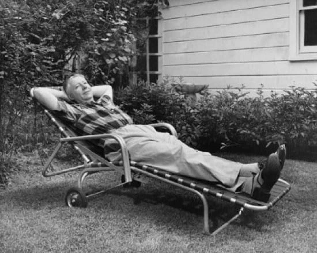 Senior man reclining in lounge chair Canvas Art - (18 x 24)
