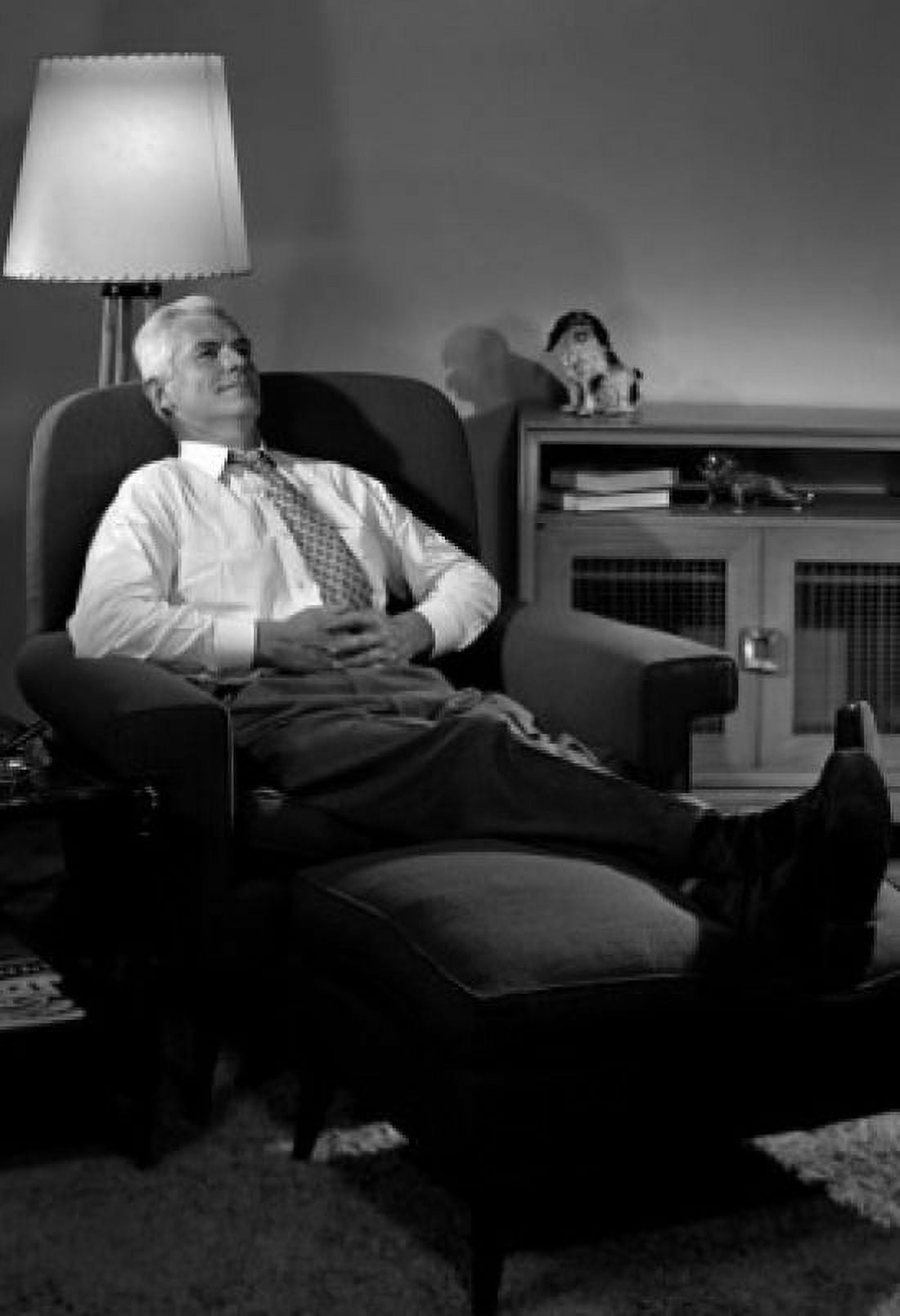 Senior man relaxing in armchair Canvas Art - (18 x 24)