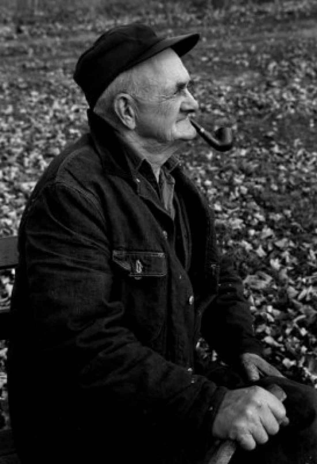 Senior man smoking pipe on bench Canvas Art - (18 x 24)