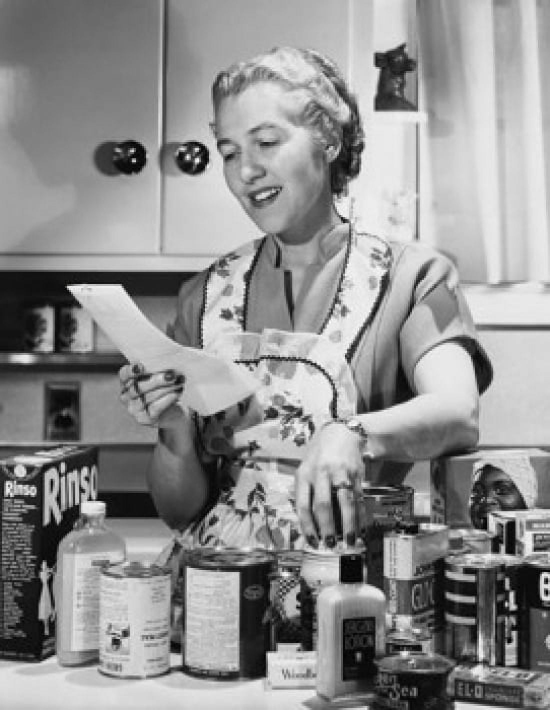 Senior woman cooking Canvas Art - (18 x 24)