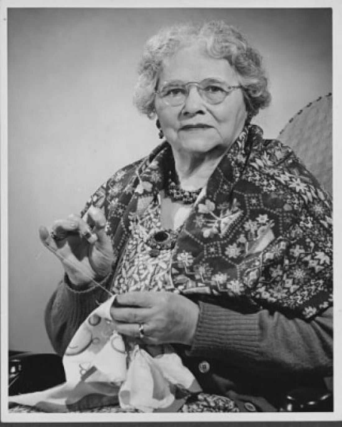 Senior woman doing needlework Canvas Art - (18 x 24)