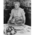 thumbnail image 1 of Senior woman holding a roasted turkey Poster Print (18 x 24), 1 of 1