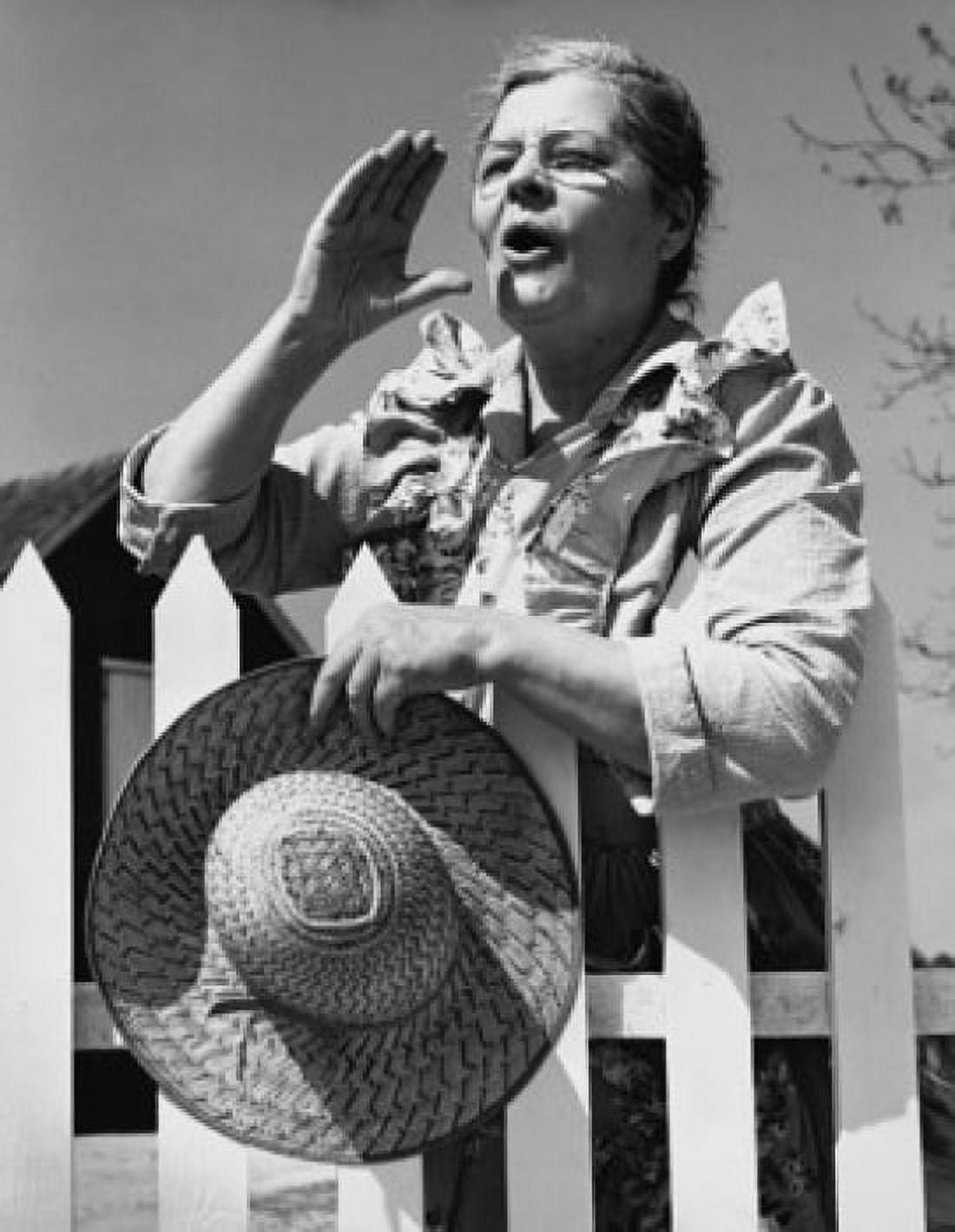 Senior woman holding a sunhat and shouting Canvas Art - (24 x 36)