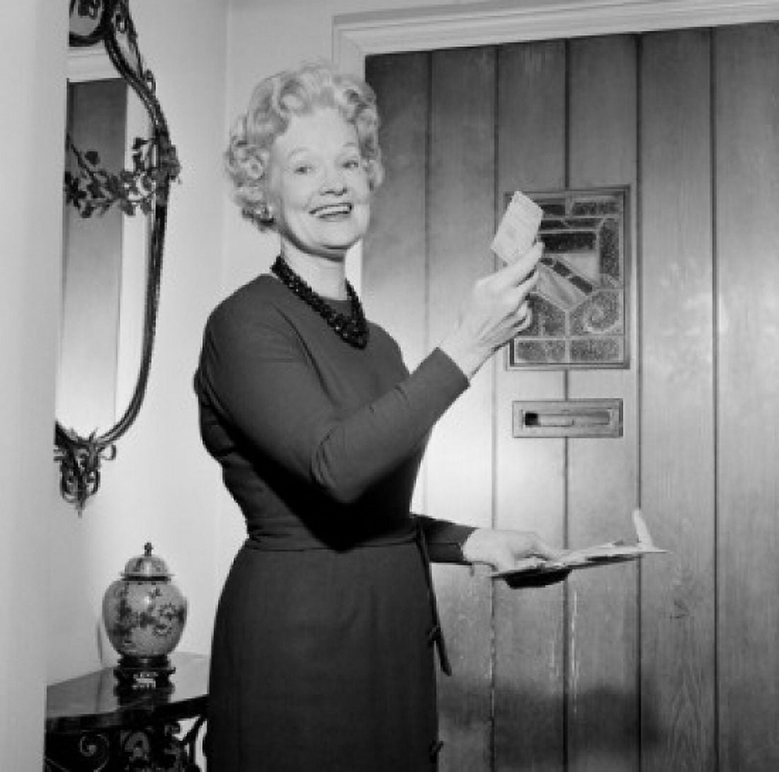 Senior woman opening and reading letter Canvas Art - (24 x 36)