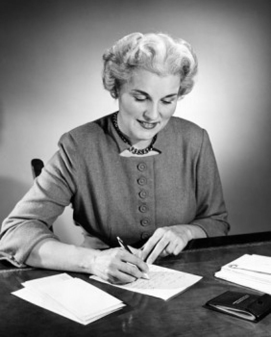 Senior woman sitting at table and writing Canvas Art - (18 x 24)