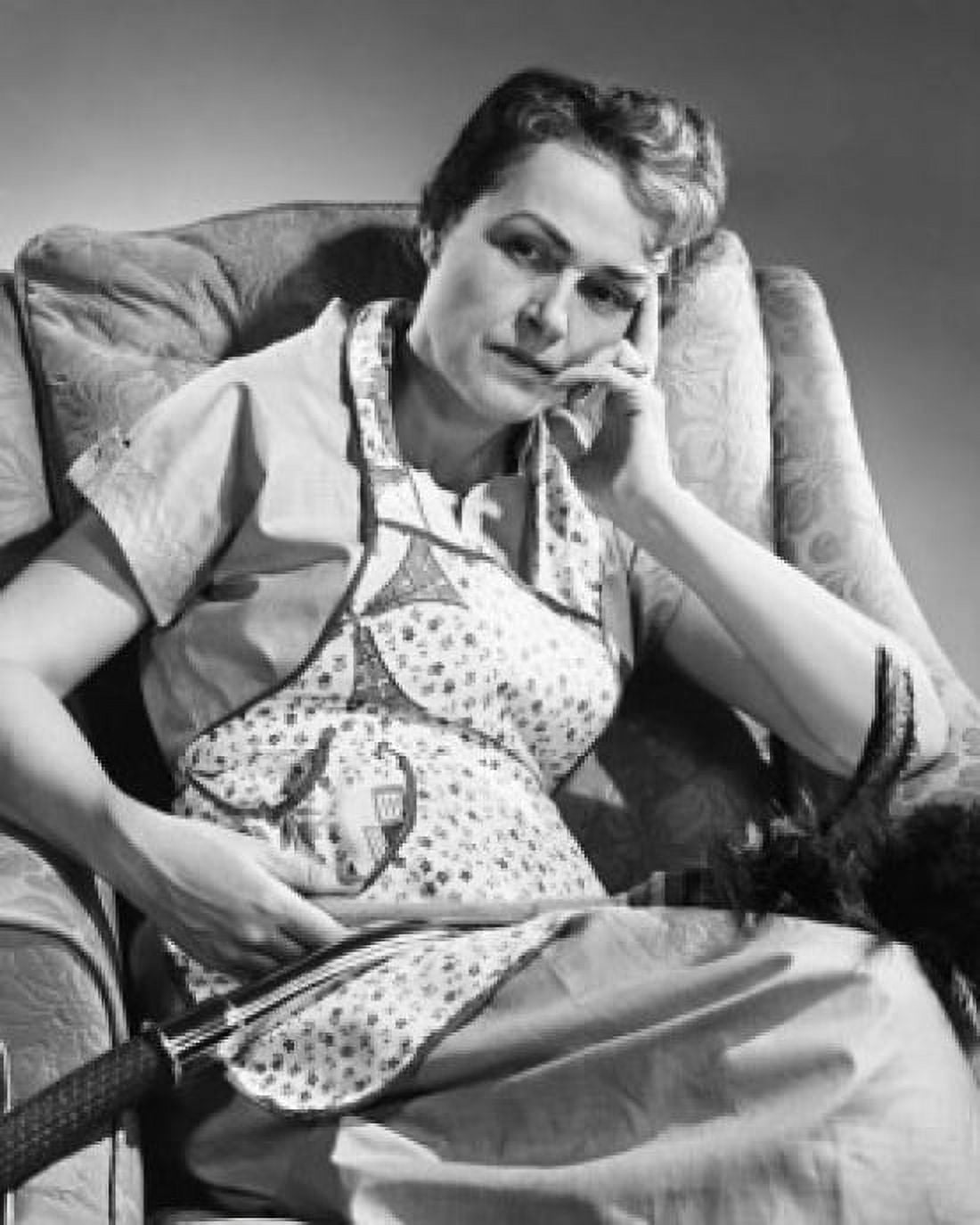 Senior woman sitting on an armchair Canvas Art - (24 x 36)