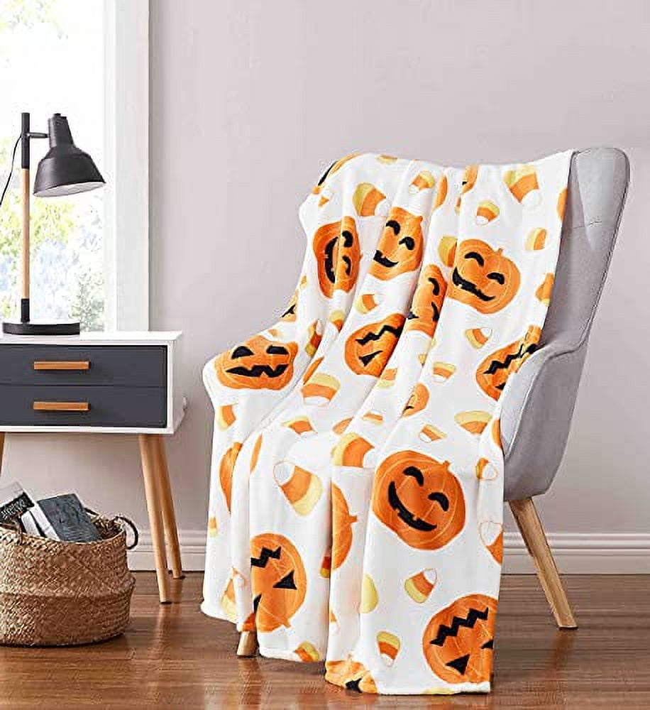 https://i5.walmartimages.com/seo/Serafina-Home-Halloween-Throw-Blanket-Plush-Soft-Velour-with-Smiling-Jack-O-Lantern-Pumpkins-with-Candy-Corns_c2a88678-703e-4260-8ff8-009ec3c22cbe.90ec4df1e68066f657e852b09d4dc098.jpeg