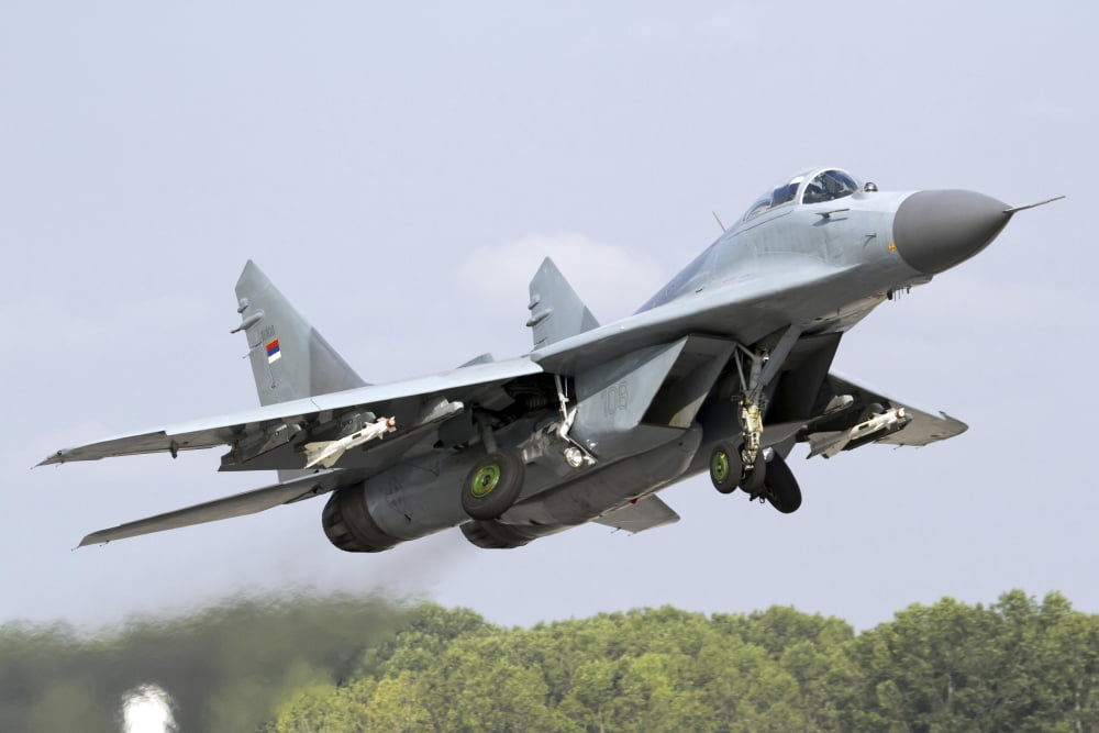 Serbian Air Force MiG-29 departing with two AA-8 Aphid missiles Canvas Art - Anton BalakchievStocktrek Images (18 x 12)