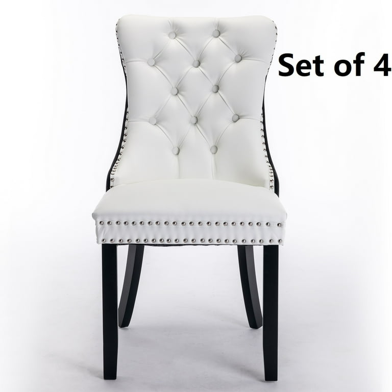 A Set of 12 Leather and Close Chrome Nailed Dining Chairs A Set of 12 Leather and Close Chrome Nailed Dining Chairs