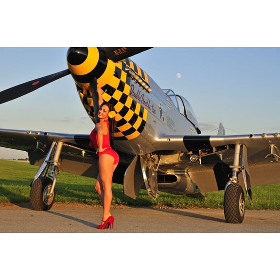 Sexy 1940s style pin-up girl posing with a P-51 Mustang Canvas Art - Christian KiefferStocktrek Images (35 x 23)