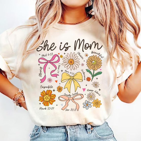 She Is Mom T-Shirt, Christian Floral Mama Shirt, Boho Wildflower T-Shirt, Mother’s Day Faith T-Shirt, Bible Verse Gift for Moms