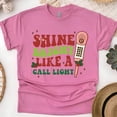 thumbnail image 1 of Shine Bright Call Light Nurse Graphic T-Shirt for Men and Women, Unisex Casual Tee, Heliconia, Size 2XL, 1 of 6