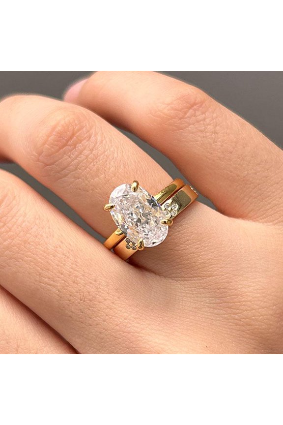 Oval Cut Engagement Ring with Clover Design Band