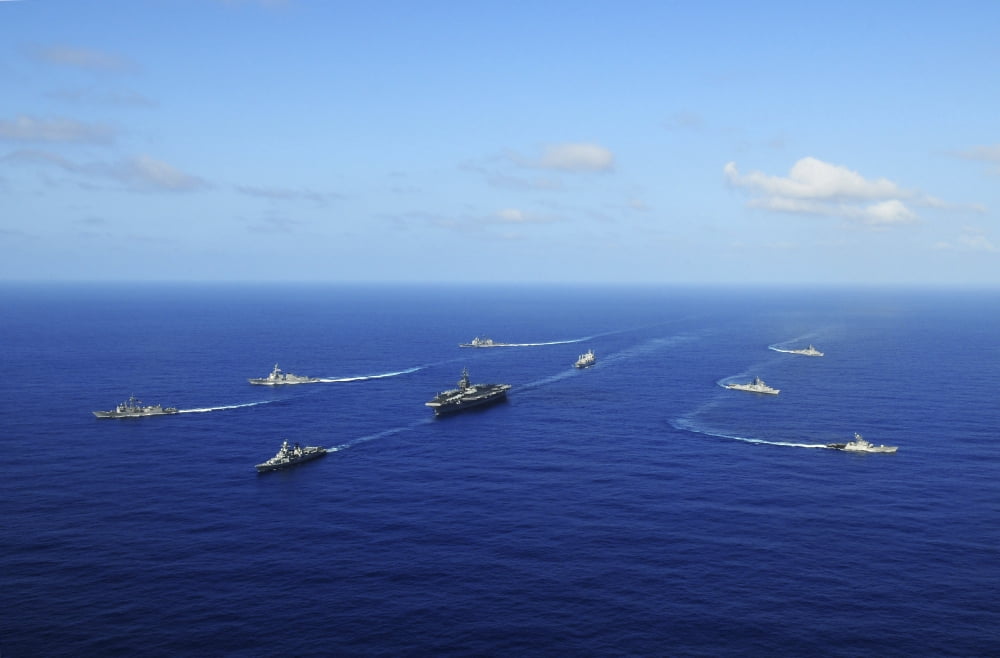 Ships from the Ronald Reagan Carrier Strike Group transit the Pacific Ocean Canvas Art - Stocktrek Images (35 x 23)