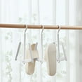 thumbnail image 1 of Shoe Drying Rack for Wet Shoes and Sneakers, Rotating Windproof Hanger with Foldable Space Saving Design for Bathroom, Balcony, Travel and Small Spaces, 1 of 6