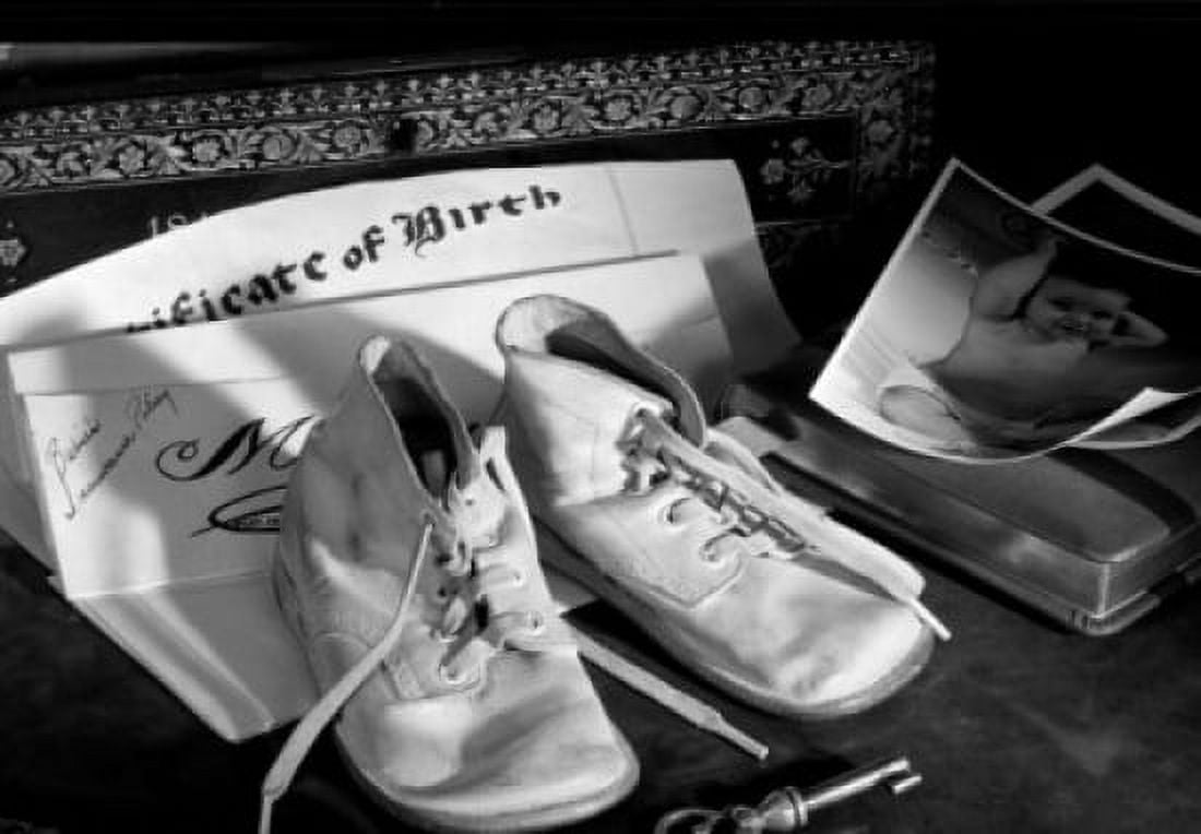 Shoes on birth certificate by baby photos Canvas Art - (18 x 24)