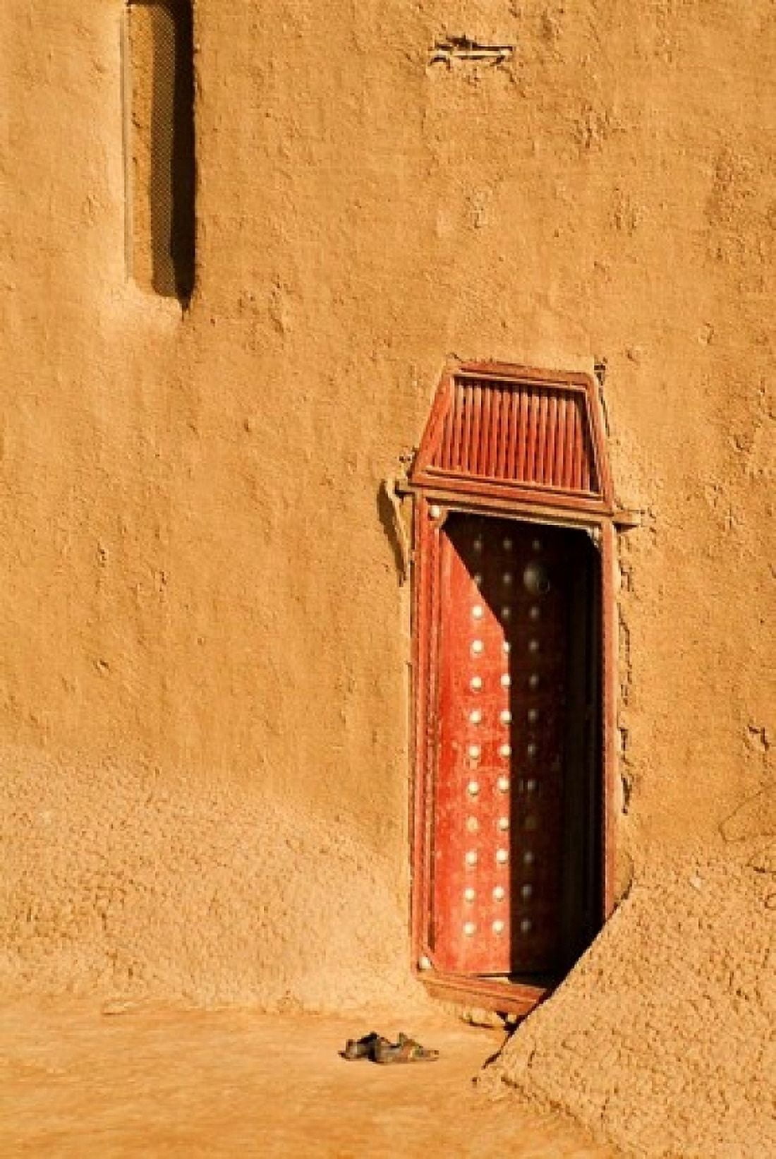 Shoes outside side door into the Mosque at Djenne Mali West Africa Canvas Art - Janis Miglavs DanitaDelimont (11 x 17)
