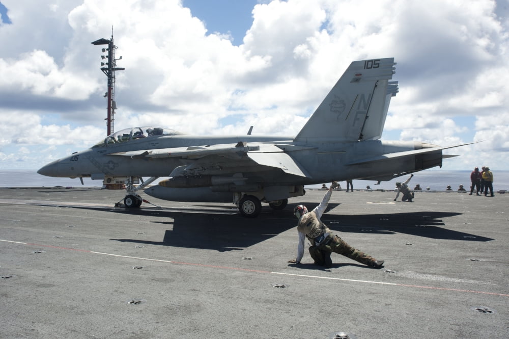 Shooters give the signal to launch an FA-18E Super Hornet Canvas Art - Stocktrek Images (34 x 23)