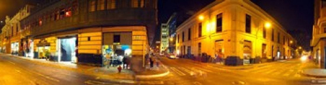 Shops along a street at night Lima Peru Canvas Art - Panoramic Images (20 x 5)