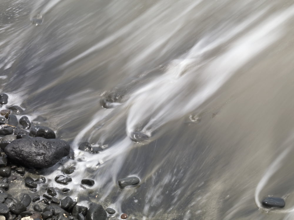 Shoreline Water Lapping Up Against A Rocky Shoreline Canvas Art - Keith Levit Design Pics (17 x 13)