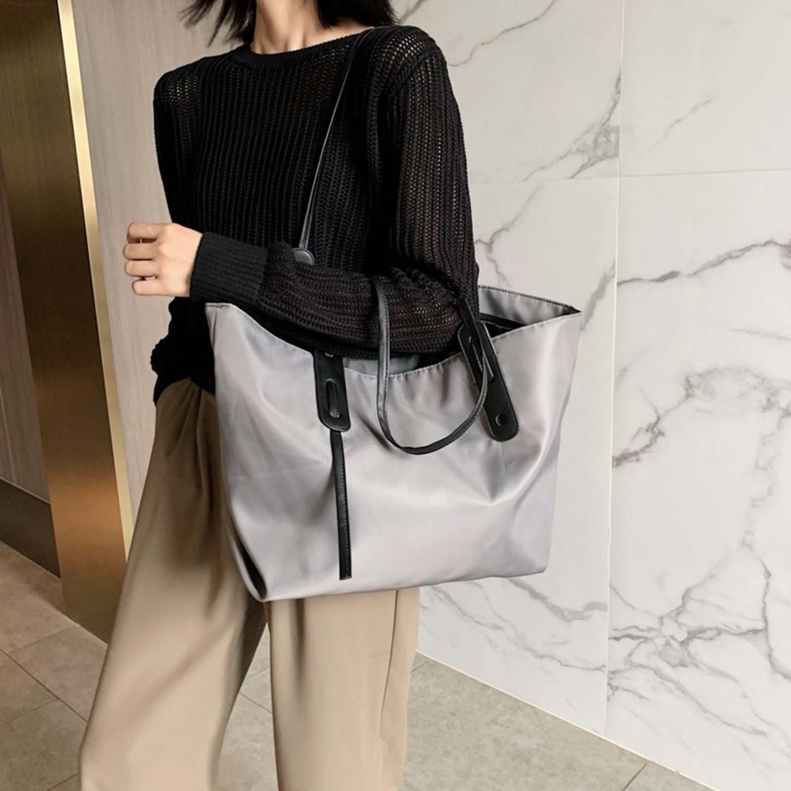 black zippered light weight travel tote bag BEIS The East / West in Designed to fit a lot TUMI Just In Case Medium