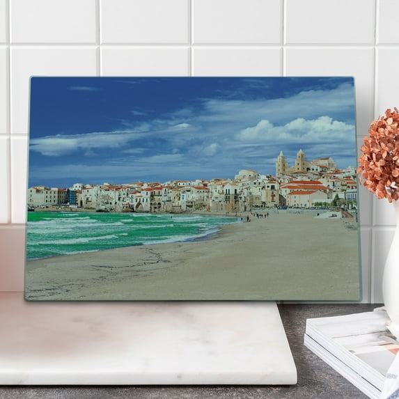 Sicily Cutting Board, Dreamy Photo of Beach at Cefalu Italy Sea Sky and Buildings in Vibrant Colors, Decorative Tempered Glass Cutting and Serving Board, in 3 Sizes, by Ambesonne