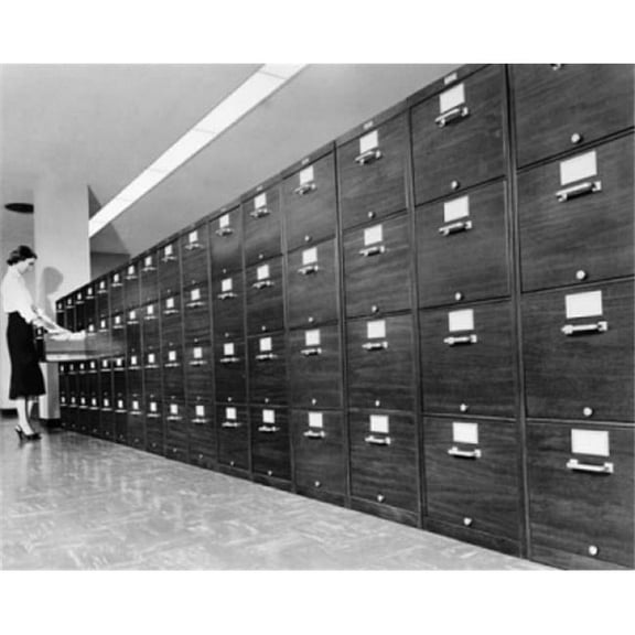 Side Profile of a Businesswoman Searching for Files in a Filing Cabinet Poster Print - 18 x 24 in.