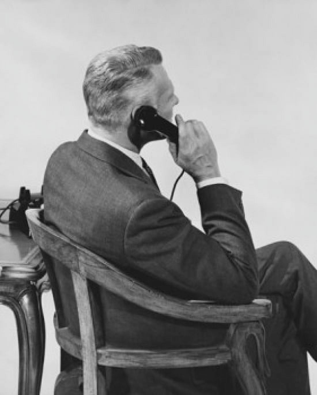 Side Profile of a businessman using a telephone Canvas Art - (24 x 36)