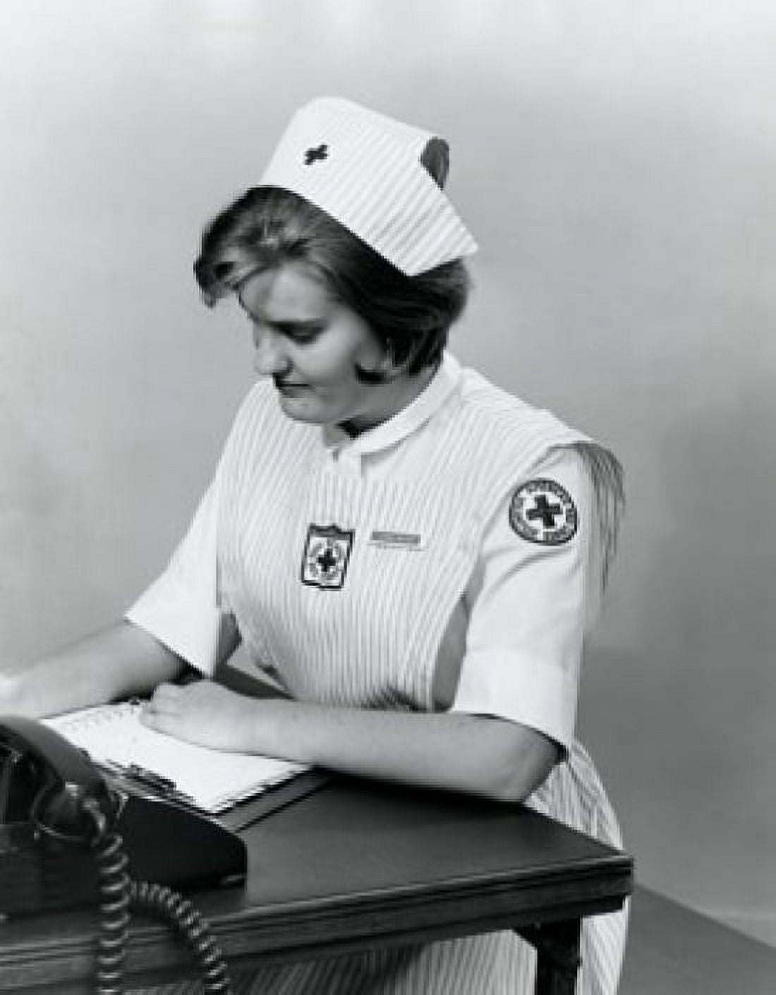 Side profile a female nurse scheduling appointments Canvas Art - (18 x 24)