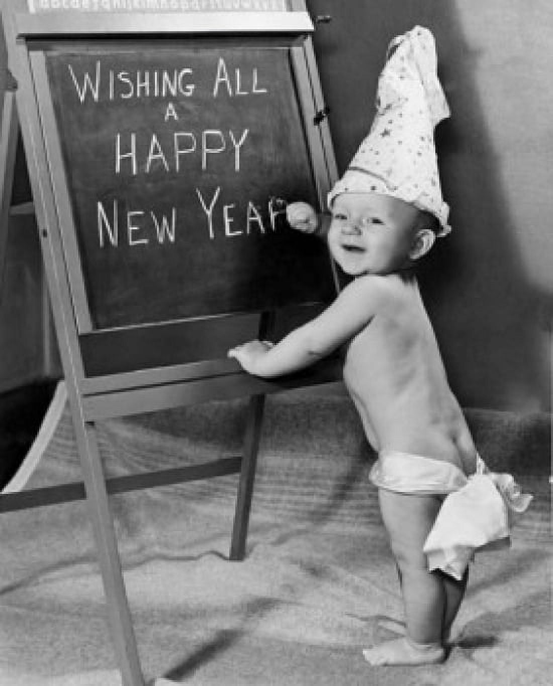 Side profile of a baby boy writing on a blackboard Canvas Art - (18 x 24)