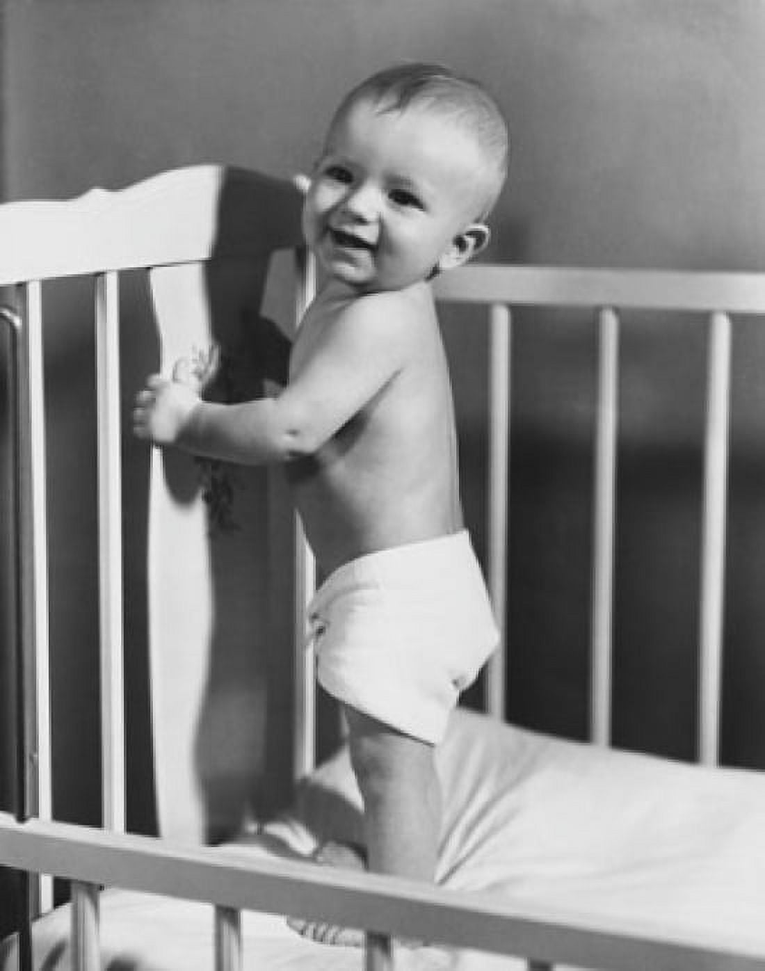 Side profile of a baby standing in a crib Canvas Art -  (18 x 24)