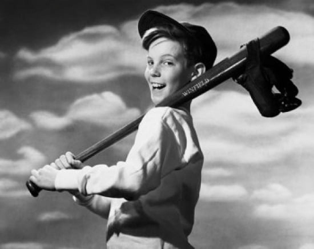 Side profile of a boy carrying a baseball bat and baseball glove on his shoulder Canvas Art - (18 x 24)