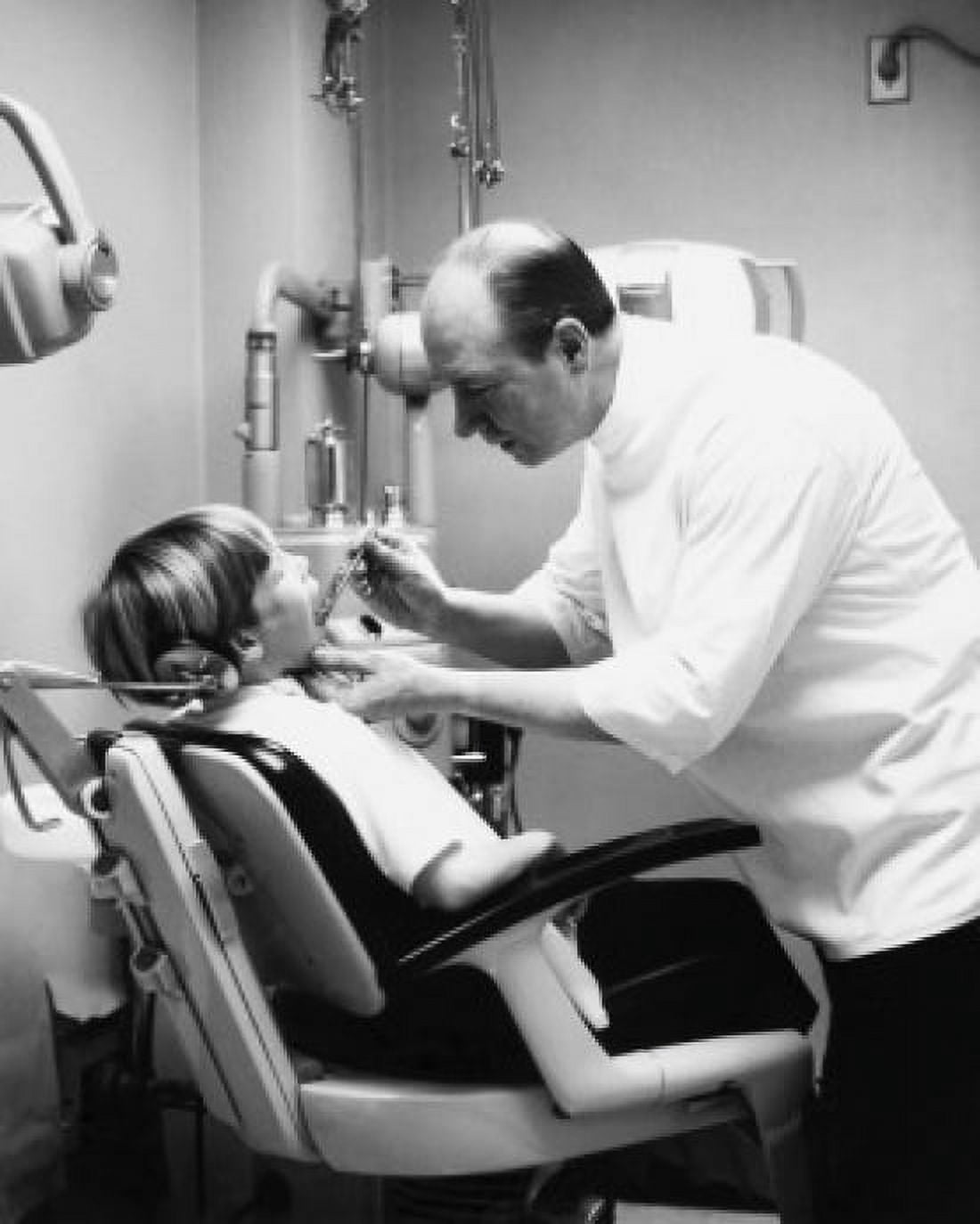 Side profile of a boy getting treatment from a dentist Canvas Art - (24 x 36)