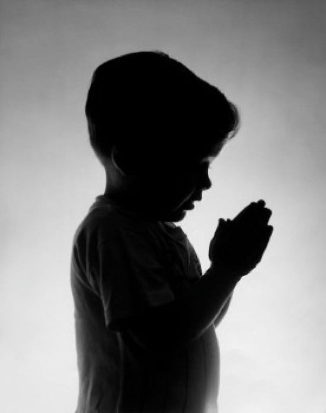 Side profile of a boy praying Canvas Art - (24 x 36)
