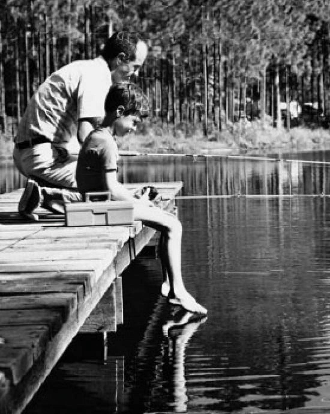 Side profile of a boy with his father sitting on a pier and fishing in a lake Canvas Art - (18 x 24)