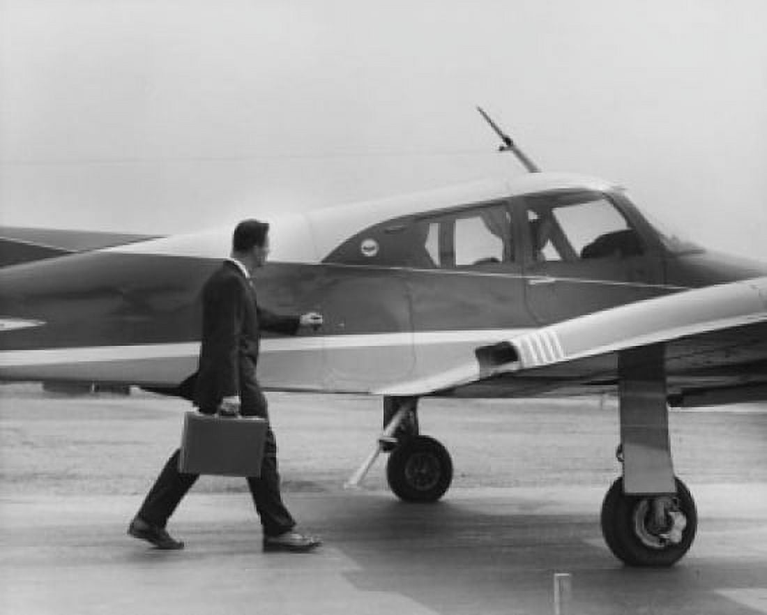 Side profile of a businessman boarding an airplane Canvas Art - (18 x 24)