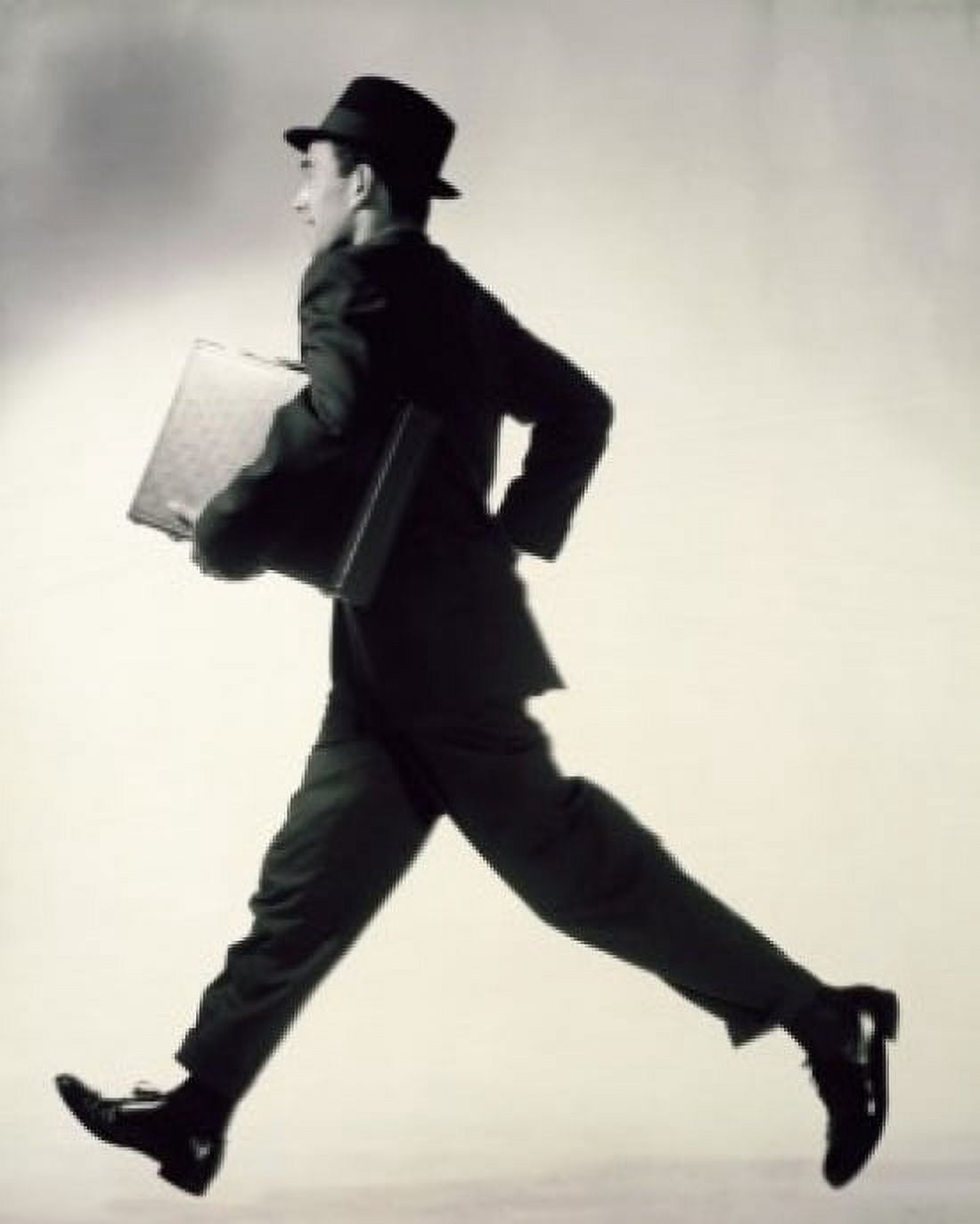 Side profile of a businessman running with a briefcase Canvas Art - (18 x 24)