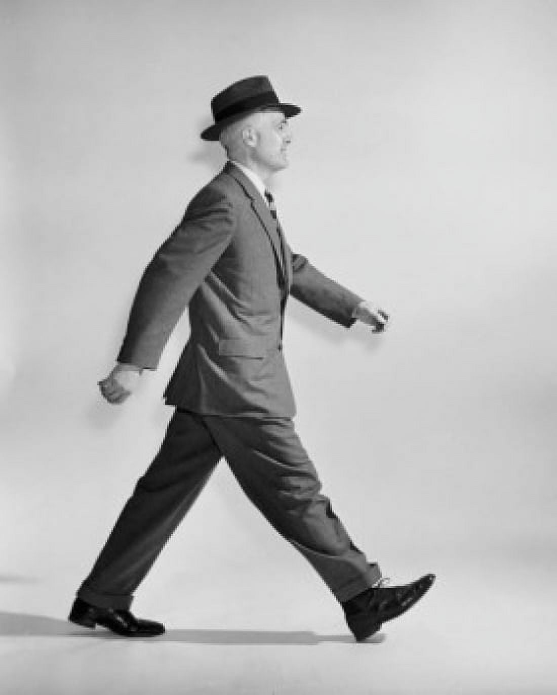 Side profile of a businessman walking Canvas Art - (18 x 24)
