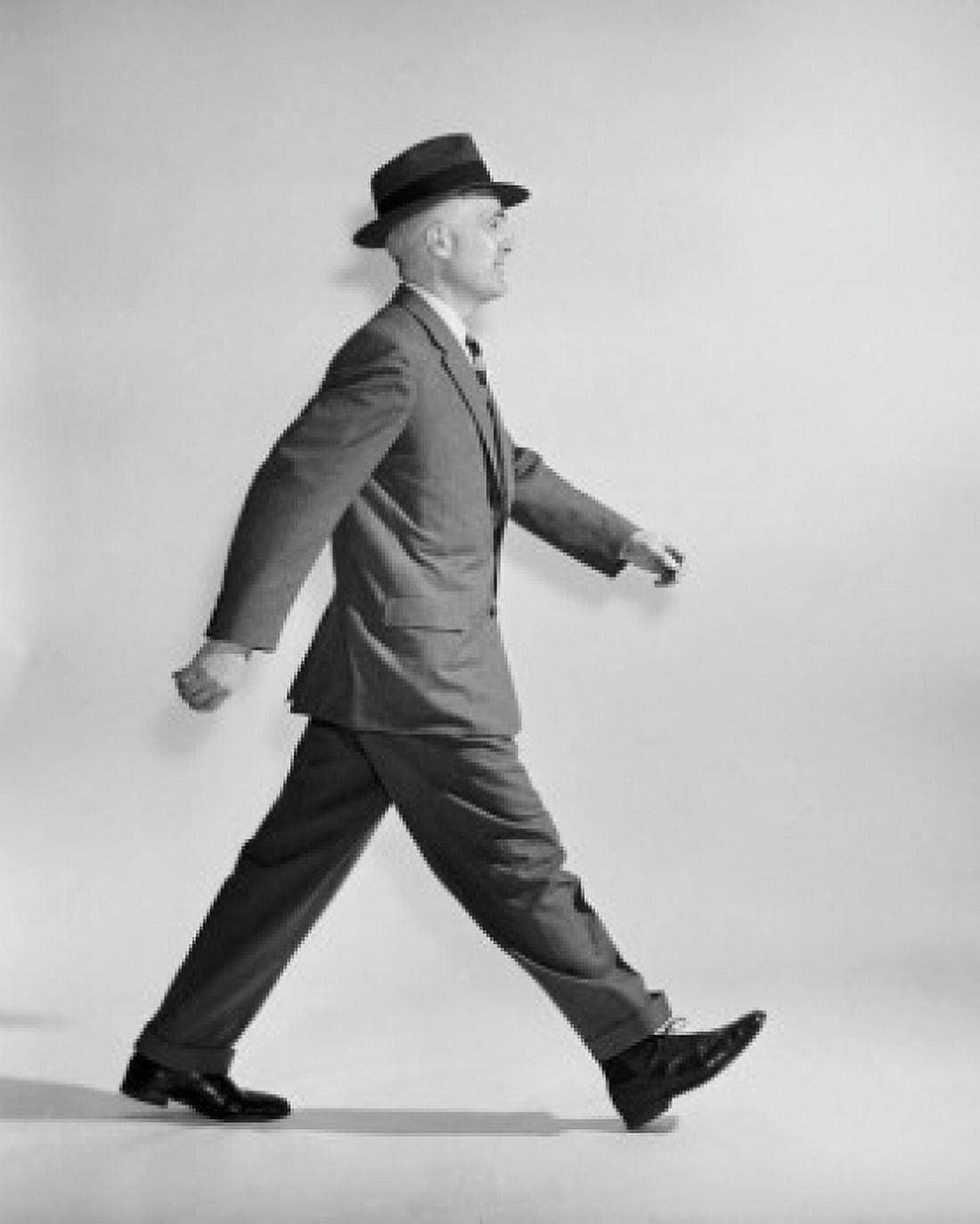 Side profile of a businessman walking Canvas Art - (24 x 36)