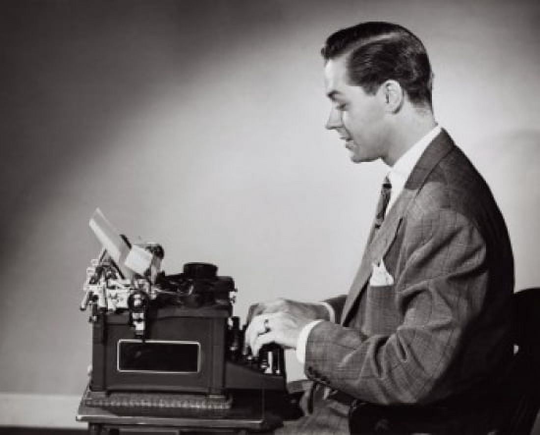 Side profile of a businessman working on a typewriter Canvas Art - (18 x 24)