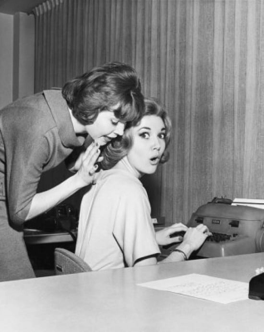 Side profile of a businesswoman whispering to another businesswoman in an office Canvas Art -  (18 x 24)